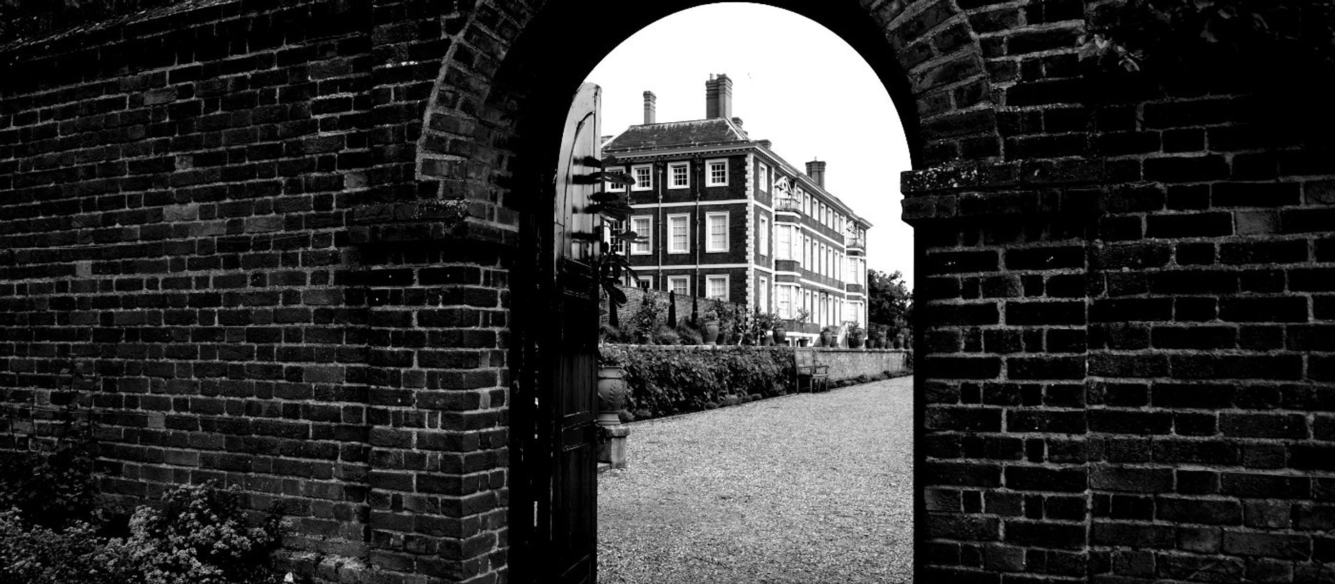 ham house, taken through an archway from the garden